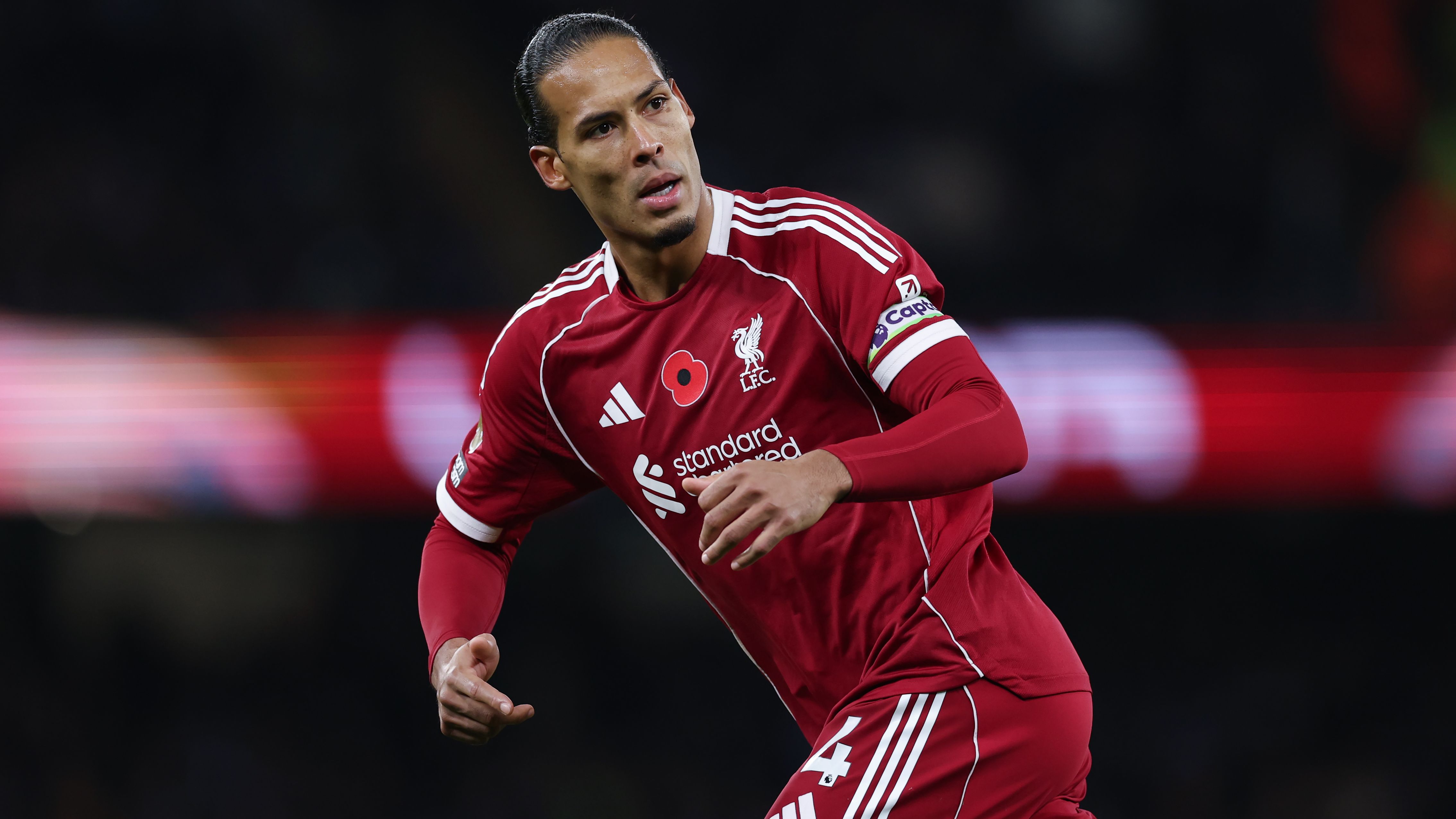 Wayne Rooney Retracts ‘Downed Tools’ Criticism of Virgil van Dijk, Urges Liverpool Captain to Ignore Distractions and Focus on Performance Amid Team’s Struggles